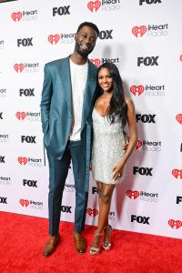 Dotun Olubeko, Charity Lawson at the 2025 iHeartRadio Music Awards held at the Dolby Theatre on March 17, 2025 in Los Angeles, California.