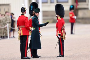 LONDON, ENGLAND - MARCH 17: Catherine, Princess of Wales presents traditional sprigs of shamrock to a member of the Irish Guards¬†during the 2025 Irish Guards' St. Patrick's Day Parade at Wellington Barracks on March 17, 2025 in London, England. Catherine, Princess of Wales attends the parade as Colonel of the Regiment. (Photo by Chris Jackson/Getty Images)