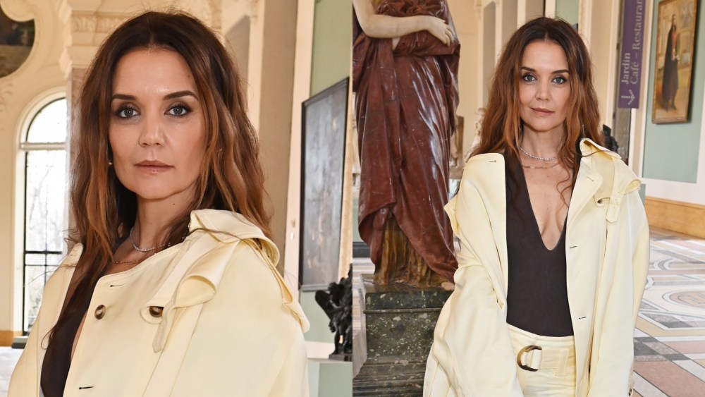 Katie Holmes poses for photos ahead of Zimmermann's fall 2025 show during Paris Fashion Week.