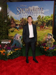 LOS ANGELES, CALIFORNIA - MARCH 15: Adam Krueger joins Sneezy & Sleepy at the Allegra activation on the red carpet for Disney's "Snow White" premiere at El Capitan Theatre on March 15, 2025 in Hollywood, California. The Allegra activation asks what Sneezy and Sleepy would be like if they weren't sneezy or sleepy. (Photo by Phillip Faraone/Getty Images for Allegra)