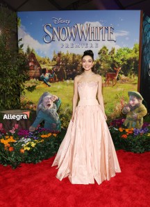 LOS ANGELES, CALIFORNIA - MARCH 15: Rachel Zegler joins Sneezy & Sleepy at the Allegra activation on the red carpet for Disney's "Snow White" premiere at El Capitan Theatre on March 15, 2025 in Hollywood, California. The Allegra activation asks what Sneezy and Sleepy would be like if they weren't sneezy or sleepy. (Photo by Phillip Faraone/Getty Images for Allegra)