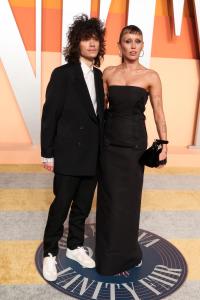 Maxx Morando, Miley Cyrus at the 2025 Vanity Fair Oscar Party Hosted By Radhika Jones held at Wallis Annenberg Center for the Performing Arts on March 02, 2025 in Beverly Hills, California.