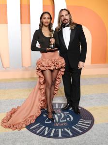 Zoe Saldana, Marco Perego-Saldaña at the 2025 Vanity Fair Oscar Party Hosted By Radhika Jones held at Wallis Annenberg Center for the Performing Arts on March 02, 2025 in Beverly Hills, California.