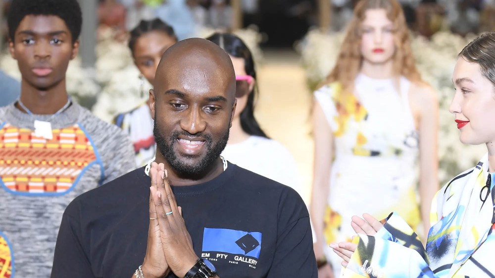 Virgil Abloh with models on the runway at the Off-White spring 2020 menswear fashion show finale in Paris, France.