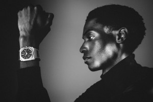Bulgari Octo Finissimo watch with mechanical manufacture movement, automatic winding, platinum micro rotor, small seconds, thin satin-polished stainless steel case and bracelet, transparent case back and black matte dial; Hermès wool pullover and Dior wool twill pants; Celine Homme by Hedi Slimane belt.