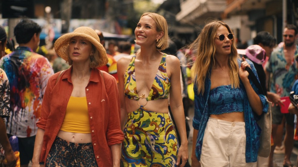 Kate at the center, played by actress Leslie Bibb, wears an Alemais dress during a scene from the "White Lotus."