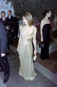 Elizabeth Hurley (C) and Sigourney Weaver (R) attend a Council of Fashion Designers of America event at JP Morgan Atrium in New York City on February 9, 1998.