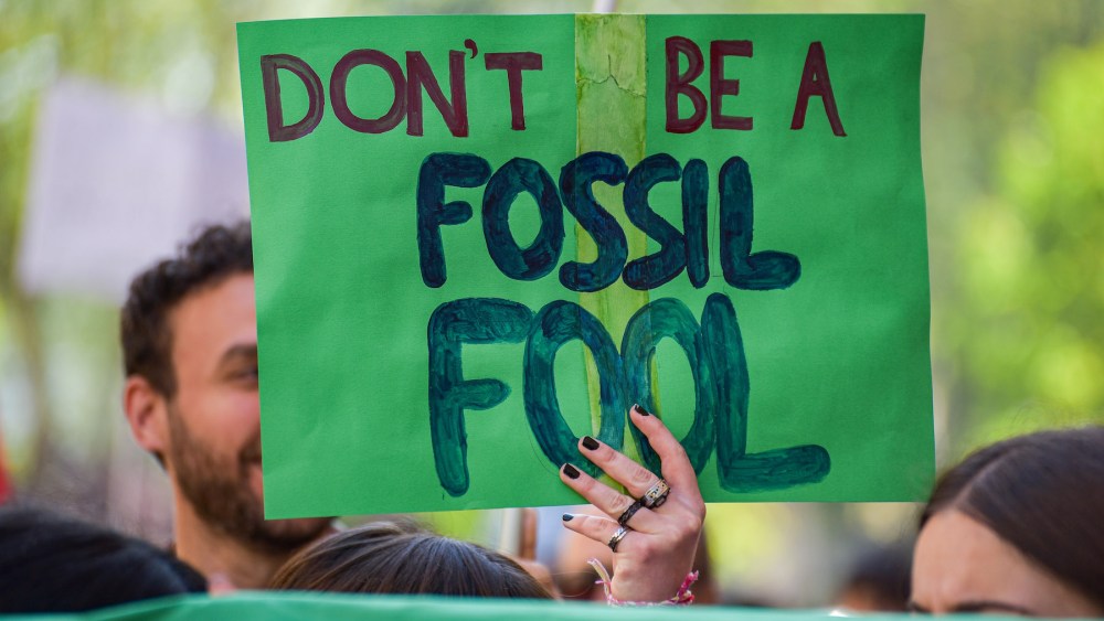 A protester holds a placard during the demonstration. Climate activists held a demonstration organized by Fridays For Future as part of the Global Climate Strike calling for action against climate change.