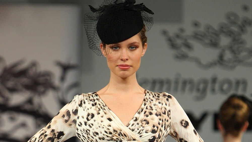 MELBOURNE, AUSTRALIA - MARCH 09:  A model showcases designs by Perri Cutten on the catwalk during the Flemington Beautiful Girls Fashion Lunch at The Atrium, Flemington Racecourse on March 9, 2011 in Melbourne, Australia.  (Photo by Graham Denholm/Getty Images)