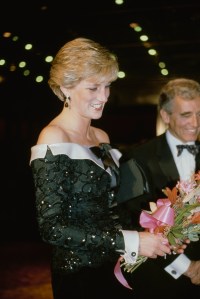 Diana, Princess of Wales  (1961 - 1997) attends a gala concert at the Barbican Centre in London, October 1990. She is wearing a green beaded cocktail dress by David Sassoon and Lorcan Mullany of Bellville Sassoon.  (Photo by Jayne Fincher/Princess Diana Archive/Getty Images)