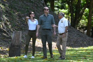 Britain's Prince William (C), Duke of Cambridge and Britain's Catherine (L), Duchess of Cambridge, tour the Caracol Mayan archaeological site at the Chiquibul Forest Reserve, in Good Living Camp, Belize on March 21, 2022. (Photo by Johan ORDONEZ / AFP) (Photo by JOHAN ORDONEZ/AFP via Getty Images)