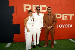 GREEN BAY, WISCONSIN - APRIL 24: Cornerback Will Johnson (C) of Michigan arrives with his parents Kafi Kumasi (L) and Deon Johnson (R) prior to the 2025 NFL Draft at Lambeau Field on April 24, 2025 in Green Bay, Wisconsin.  (Photo by Michael Reaves/Getty Images)