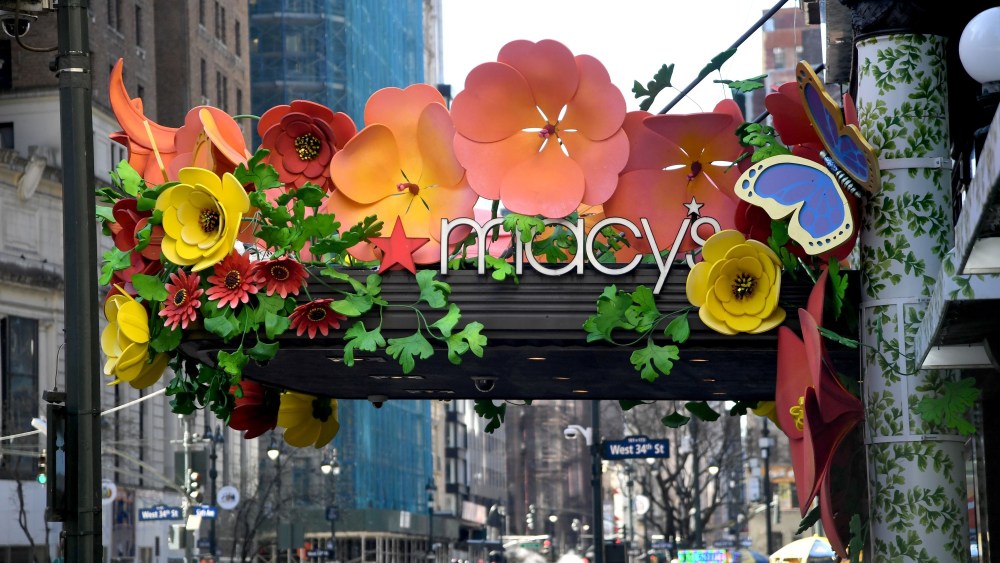 Macy's sign with flower installation.