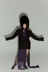Acne Studios wool suit jacket and silk scarf. Archival Moschino hat.
