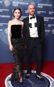 Lily Collins, Charlie McDowell at The 11th Breakthrough Prize Ceremony held at Barker Hanger on April 05, 2025 in Santa Monica, California.