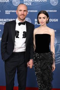 Charlie McDowell, Lily Collins at The 11th Breakthrough Prize Ceremony held at Barker Hanger on April 05, 2025 in Santa Monica, California.