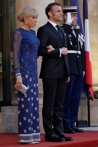 (L-R) Brigitte Macron, President Emmanuel Macron attend a state dinner on March 31 in Paris.