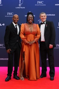 MADRID, SPAIN - APRIL 21: Steve Fleming and Puky Ramokoatsi of Kick4Life and Motlatsi Nkhahle pose at the Laureus World Sports Awards Madrid 2025 at Galer√≠a de Cristal on April 21, 2025 in Madrid, Spain. (Photo by Angel Martinez/Getty Images for Laureus)
