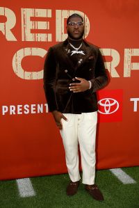 GREEN BAY, WISCONSIN - APRIL 24: Guard Tyler Booker of Alabama arrives prior to the 2025 NFL Draft at Lambeau Field on April 24, 2025 in Green Bay, Wisconsin.  (Photo by Michael Reaves/Getty Images)