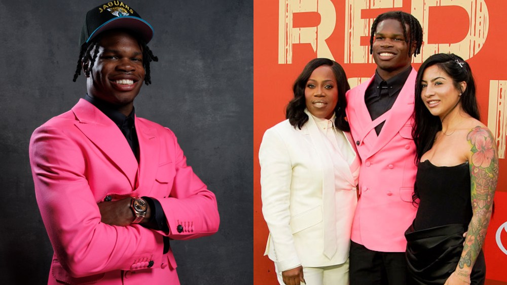 Travis Hunter of Colorado (C) and family attend the 2025 NFL Draft at Lambeau Field on April 24, 2025 in Green Bay, Wis.