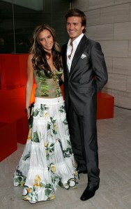 BEVERLY HILLS, CA - JUNE 03:  England and Real Madrid football player David Beckham and wife Victoria pose at "The David Beckham Academy" launch party at Creative Artists Agency on June 3, 2005 in Beverly Hills, California.  The reception was a celebration in the partnership between sports and entertainment AEG and Beckham, which has established the Los Angeles and London locations of the David Beckham Academy.  (Photo by Frazer Harrison/Getty Images for AEG)