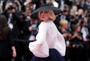 Elle Fanning in Dior at the screening of "Once Upon A Time In Hollywood" during the 72nd annual Cannes Film Festival on May 21, 2019 in Cannes, France.