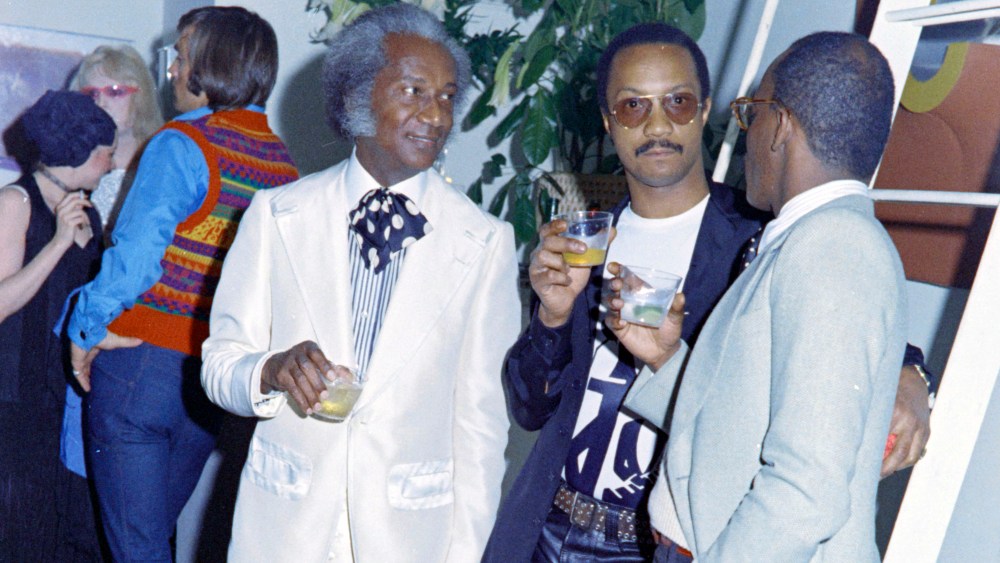 Camello "Frenchie" Casimer (L) and Bill Smith attend a party in honor of David Hockney, held in the New York City loft apartment of art dealer Michael Findlay on May 15, 1972. (Photo by Peter Simins/WWD/Penske Media via Getty Images)