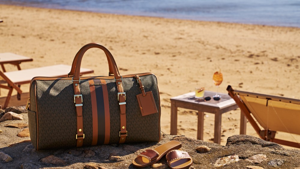 Michael Kors' Weekender Bag is part of the Jet Set Hotel Package.