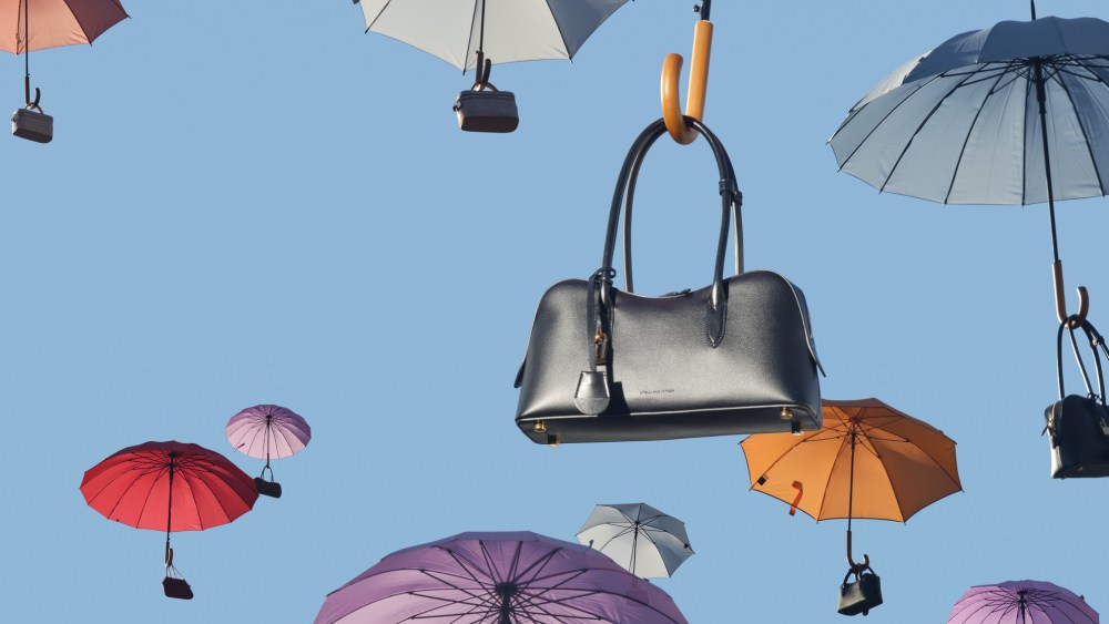 Luxury handbags arriving on Amazon via Saks.