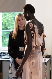 Victoire de Castellane and a model at the high jewelry fitting.
