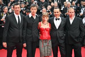 Scott O'Donnell, Harris Dickinson, Megan Northam, Frank Dillane, Archie Pearch at the "Eddington" Premiere at The 78th Cannes Film Festival at Palais des Festivals on May 16, 2025 in Cannes, France.