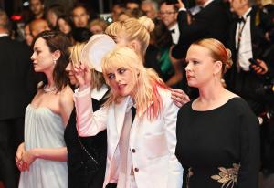 Esmé Creed-Miles, Kim Gordon, Kristen Stewart, Thora Birch at the "Bono: Stories of Surrender" Premiere at The 78th Cannes Film Festival at Palais des Festivals on May 16, 2025 in Cannes, France.