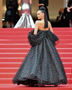 Irina Shayk at the Opening Ceremony and "Leave One Day" Premiere at the 78th Cannes Film Festival held at Palais des Festivals on May 13, 2025 in Cannes, France.