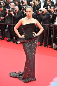 Shanina Shaik at the Opening Ceremony and "Leave One Day" Premiere at the 78th Cannes Film Festival held at Palais des Festivals on May 13, 2025 in Cannes, France.