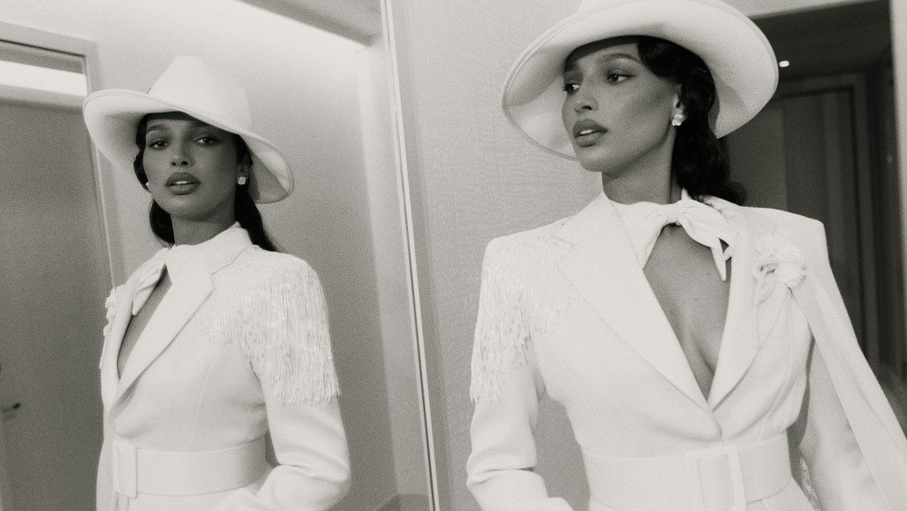 Jasmine Tookes prepares for the 2025 Met Gala, celebrating the legacy and power of Black fashion expression through fine tailoring and menswear for the Costume Institute's "Superfine: Tailoring Black Style" exhibit. Design by Ruth Carter.