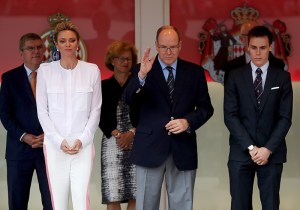 MONTE-CARLO, MONACO - MAY 29:  Prince Albert of Monaco and Princess Charlene of Monaco on the podium during the Monaco Formula One Grand Prix at Circuit de Monaco on May 29, 2016 in Monte-Carlo, Monaco.  (Photo by Lars Baron/Getty Images)