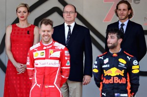 MONTE-CARLO, MONACO - MAY 28: Princess Charlene of Monaco and Prince Albert II of Monaco look on during the podium ceremony with race winner Sebastian Vettel of Germany and Ferrari and third place finisher Daniel Ricciardo of Australia and Red Bull Racing during the Monaco Formula One Grand Prix at Circuit de Monaco on May 28, 2017 in Monte-Carlo, Monaco.  (Photo by Mark Thompson/Getty Images)