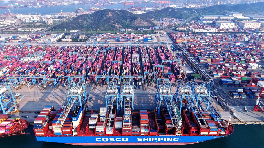 A cargo ship loaded with shipping containers berth at Qingdao Port, which has a 1.75 queue-to-berth ratio, according to data from Linerlytica.