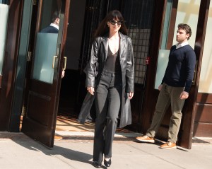 Dakota Johnson exits a hotel for a TV show taping in New York, New York.