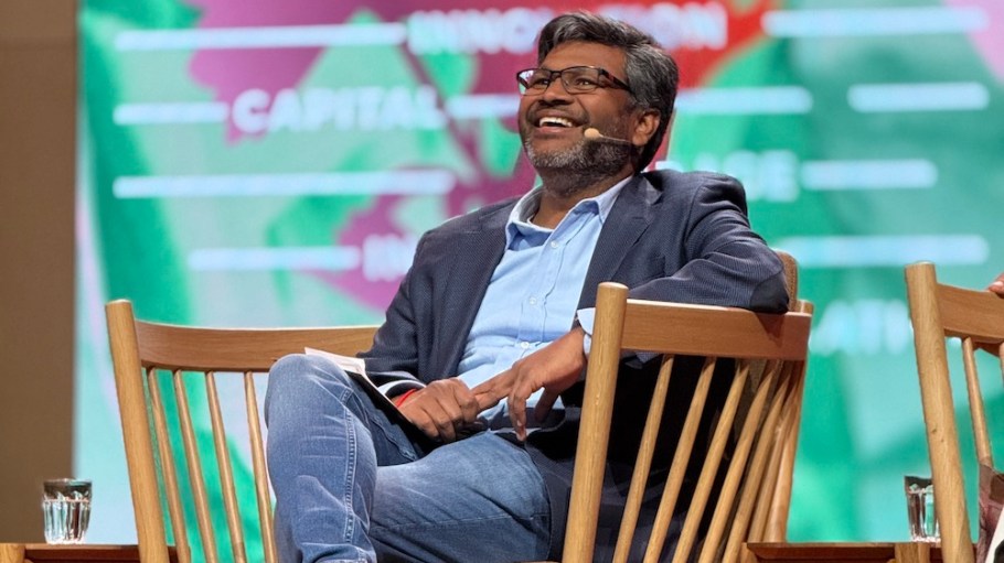 Krishna Manda on stage at the Global Fashion Summit