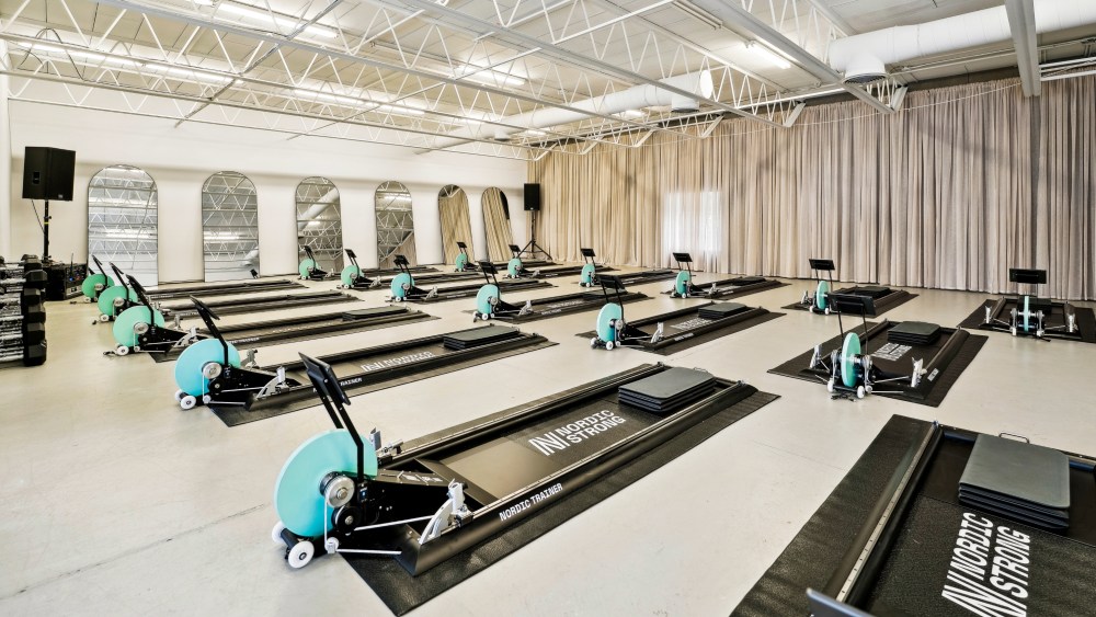 Inside the Nordic Strong studio featuring ski-inspired workout machines.