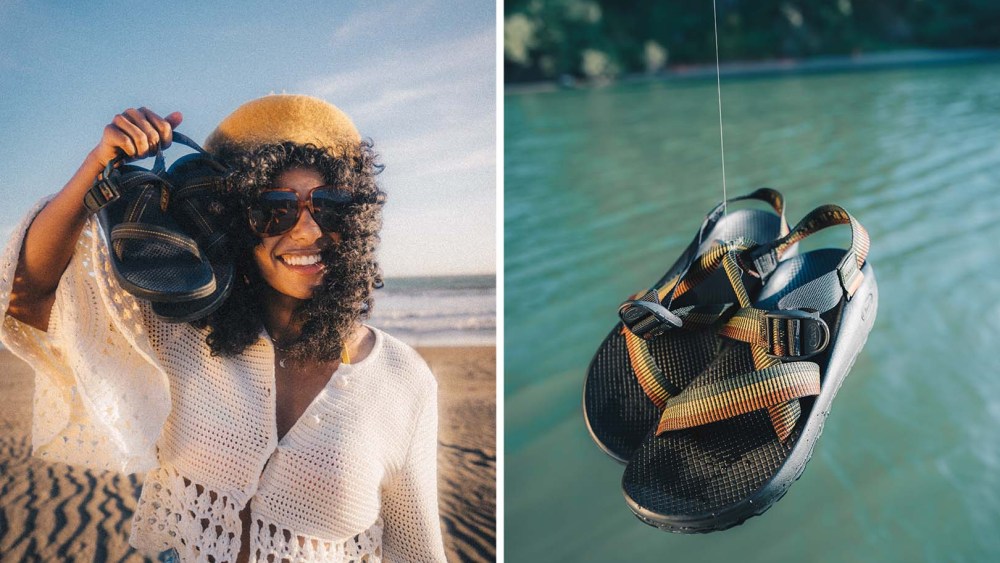 woman holding onto a pair of Chaco Z1 Sandals from the Bob Marley Collection