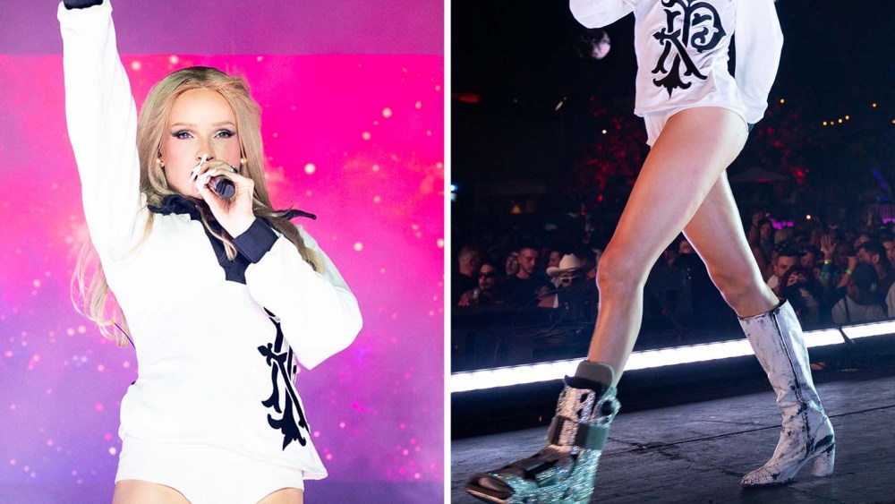 Kim Petras performing at Outloud 2025 in Maison Margiela’s white Tabi Painted Effect Boots and rhinestone-encrusted medical cast.