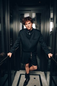 Mason Thames gets ready for Louis Vuitton Spring 2026 in Paris.