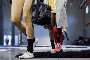 MILAN, ITALY - JUNE 22: A model, shoe and bag detail, walks the runway at the Prada fashion show during the Milan Menswear Spring/Summer 2026 Fashion Week on June 22, 2025 in Milan, Italy. (Photo by Pietro D'Aprano/Getty Images)