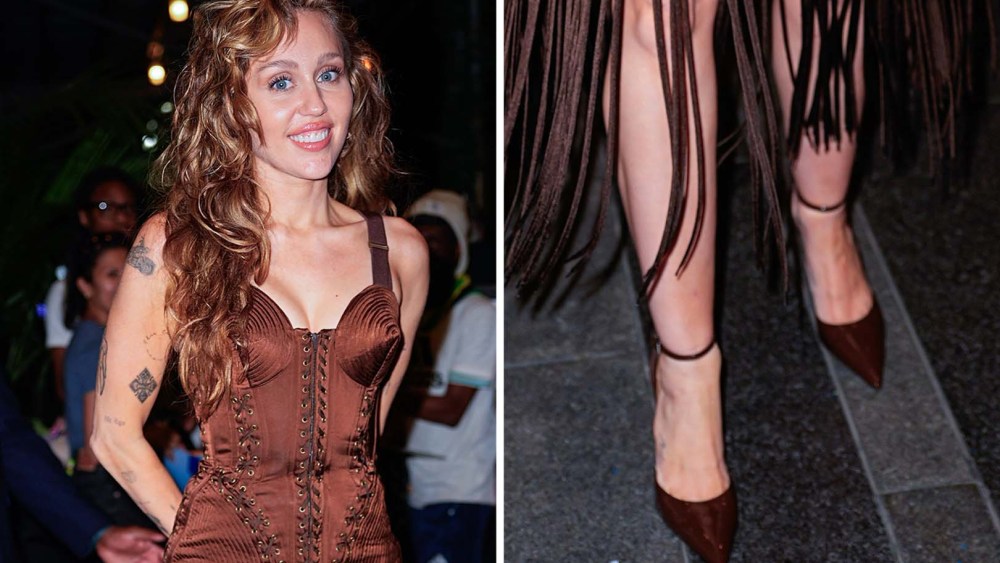 Miley Cyrus seen in NYC on June 5 in archival Jean Paul Gaultier corset fringe mini dress and matching shiny stilettos with an ankle strap.