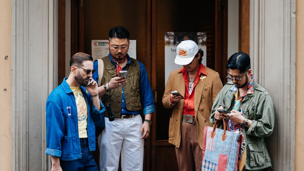 Street style during Pitti Uomo Spring 2026.