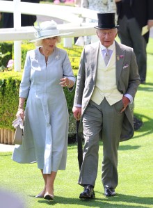 ASCOT, ENGLAND - JUNE 19: Queen Camilla and King Charles III speak to each other as they attend day three of Royal Ascot at Ascot Racecourse on June 19, 2025 in Ascot, England.  (Photo by Chris Jackson/Getty Images)