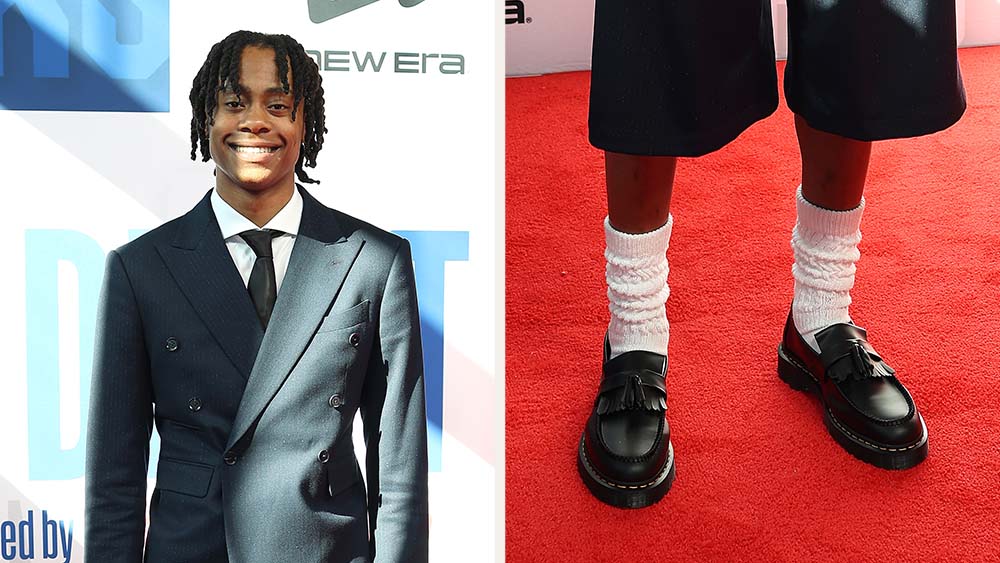 Tre Johnson in a shorts suit set and Dr. Martens Adrian Bex unisex black leather loafers at the 2025 NBA Draft,  Day One.