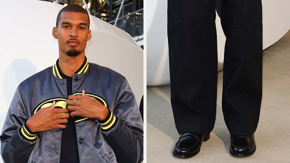 Victor Wembanyama attending the Louis Vuitton spring 2026 menswear show in leather loafers.